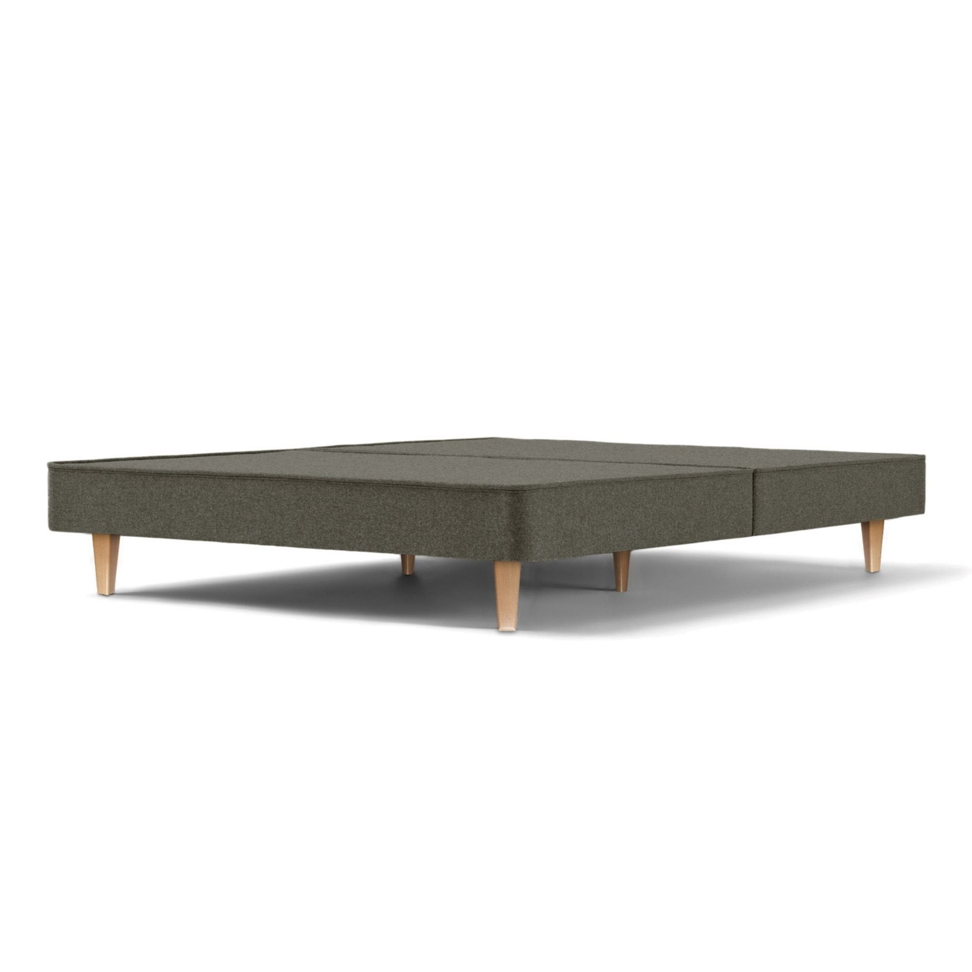 The Woolroom Audley Upholstered Divan with wooden legs in the dark grey upholstery.